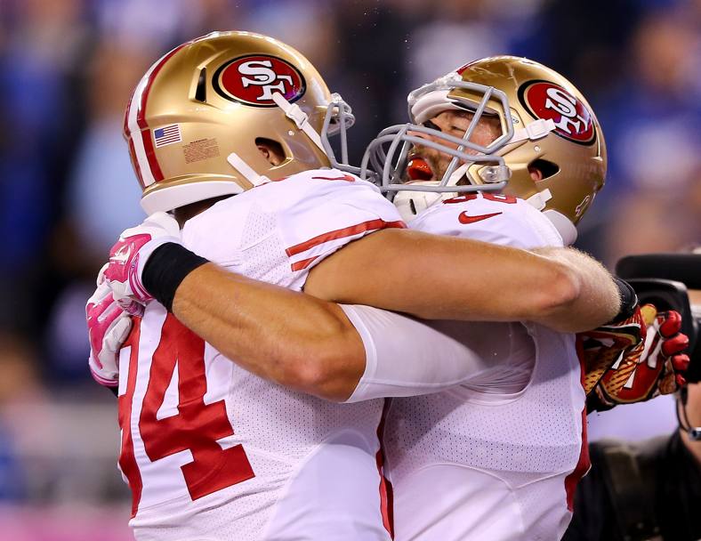 La gioia dopo un touchdown per i giocatori dei San Francisco 49ers nella gara contro i New York Giants. Ma alla fine sono i Giants i vincitori con il risultato finale di 30-27 (Afp)